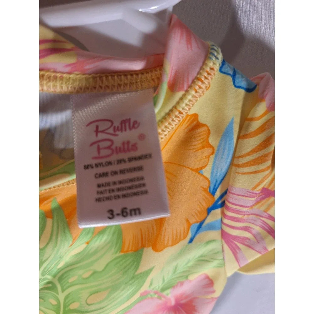 RuffleButts Baby Girls Yellow Tropical Floral Rash Guard Swimsuit 3-6M